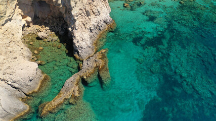 Aerial drone photo of volcanic island with Perlite rock in tropical exotic destination