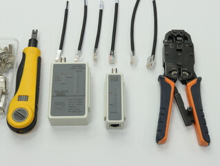 Tools and devices for making patch cords for connecting to the Internet.