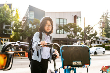 Young professional using bike share in urban setting