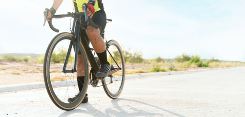 Naklejka premium Male athlete practicing his cycling skills