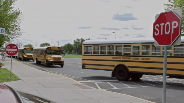 20 MAY 2021 Bensalem Pennsylvania USA : Transport for students children educational yellow school bus on the street