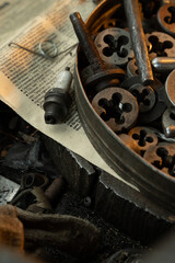 old rusty locksmith dies and taps for tapping. Lie box top view.