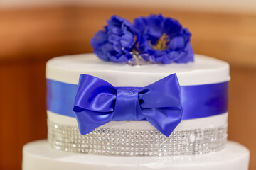 Wedding Cake with blue  ribbon