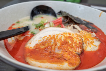 Spicy Shoyu Ramen, Japanese noodle soup, with pork belly Chashu and Nori.