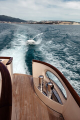 view from the yacht to the sea and a tied inflatable boat - 447571110
