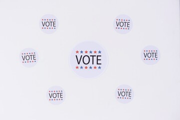 Vote stickers on a white surface
