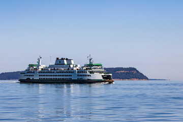 Fototapeta na wymiar Washington State Ferry on Clinton-Mukilteo Route Passes South Tip of Camano Island