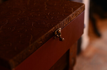 brown box on a wooden table
