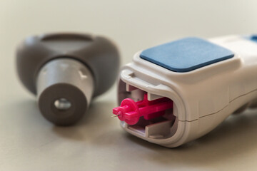 Blood sugar measuring: Close-up of equipment and a lancet to get blood for blood glucose analysis