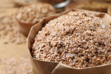 Paper bag with wheat bran, closeup view