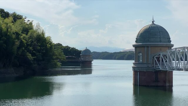 Lake sayama at Tokyo Japan. Impressive sky with clear horizon and beautiful scenery, there is an intake tower.