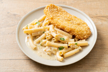 quadrotto penne pasta white cream sauce with fried fish