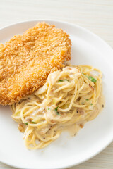 spaghetti pasta white cream sauce with fried fish