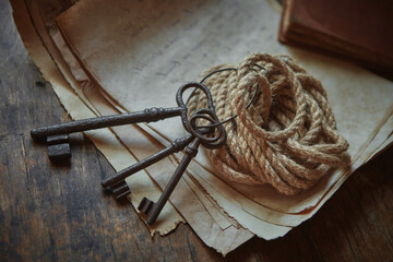 Rope, keys and a manuscript. Preparation of equipment for the discoverer, traveler.