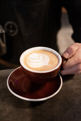 pouring coffee into cup
