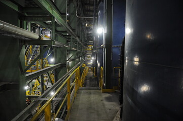 Pavlodar region, Kazakhstan - 12.10.2015 : Pipes and tanks with a centrifuge for processing sulfide ore