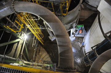 Pavlodar region, Kazakhstan - 12.10.2015 : Pipes and tanks with a centrifuge for processing sulfide...