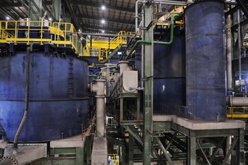 Pavlodar region, Kazakhstan - 12.10.2015 : Pipes and tanks with a centrifuge for processing sulfide ore