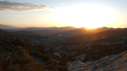 Sunset at the desert section from Tehachapi Pass on the Thru Hiking footpath PCT (Pacific Crest Trail) in California, USA. 