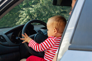 Baby boy driver. Travel with kids concept.