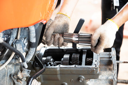 Mechanic Repairing Agricultural Tractors, Old Tractors.