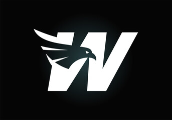 Initial W monogram letter alphabet with Eagle head negative space symbol. Creative Eagle head vector illustration. Modern logo design for business, and company identity.