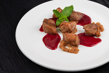 Pork meat with berries sauce