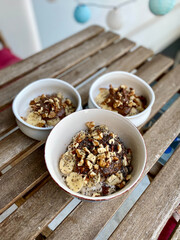Chocolate Peanut Butter Flavored with Walnut, Cocoa in Healthy Breakfast Bowl and Porridge Chia Seeds.