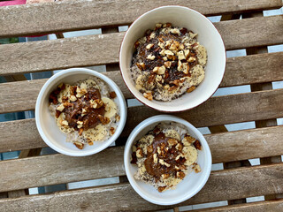 Chocolate Peanut Butter Flavored with Walnut, Cocoa in Healthy Breakfast Bowl and Porridge Chia Seeds.