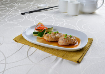 braised cook scallop with cuttlefish prawn paste ball seafood in oyster sauce in white background asian halal menu
