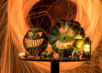 Terrible Halloween symbol - Jack-o-lantern. Terrible pumpkin head in the flames of hell fire. Glowing burning face, trick or treat. Halloween time.