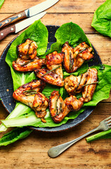 Fried chicken wings in teriyaki sauce