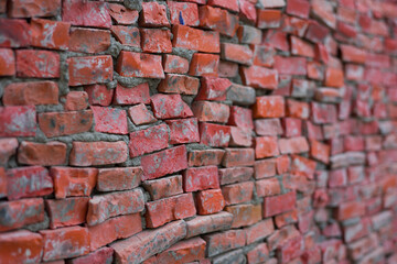 brick wall of red color,  soft focus