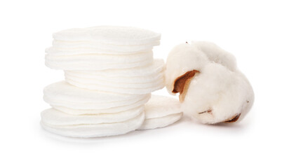 Cotton pads and flower on white background