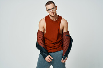 handsome man wearing hat red t shirt fashion posing studio