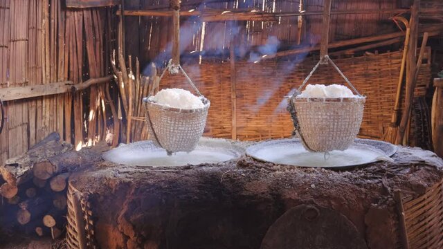 Salt production , Boiling rock salt or Sin Thao salt at Bo Kluea, Nan, Thailand