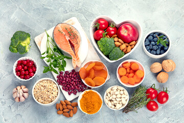 Best products for heart on dark gray background. Clean eating concept.