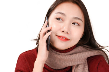 Asian business woman using smartphone, Winter outfit wear red sleeves and pink scarf, isolated with white background
