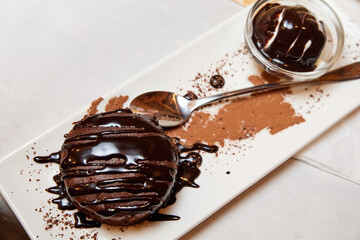 Classic chocolate fondant with ice cream. Close-up, selective focus