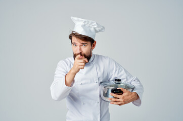 male chef with white hat on his head restaurant kitchen service