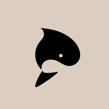 Vector illustration of a stylized killer whale. Logo. Flat design..