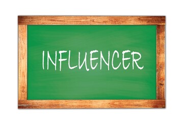 INFLUENCER text written on green school board.