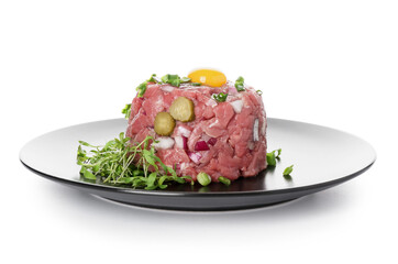 Plate with tasty beef tartare on white background