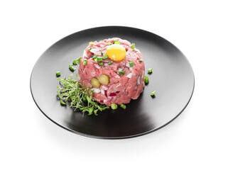 Plate with tasty beef tartare on white background