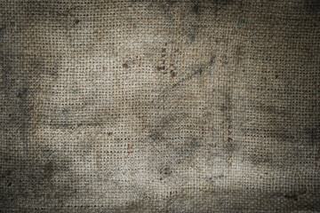 Dirty burlap sack with oily texture can be use as background