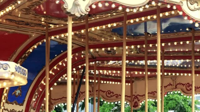 Carousel rotating in the park.