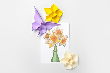 Greeting card, origami narcissus flowers and butterfly on white background
