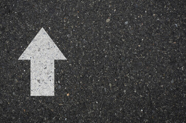 Asphalt with a up arrow sign. Tarmac road with right arrow sign