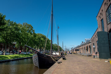 Old sailing boats in the harbor of Den Helder, the Netherlands.