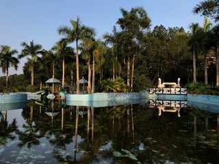 Fototapeta na wymiar Hue, Vietnam, January 23, 2020, Abandoned Waterpark, Slide and swimming pool left behind, Hue, Vietnam